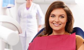 A smiling lady undergoing dental check up in Oatley, NSW