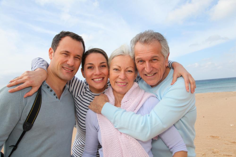 Friends posing for a photo after getting dental crowns at CFS Dental