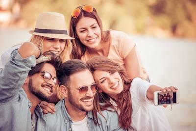 A group smiling after dental braces in Oatley, NSW.