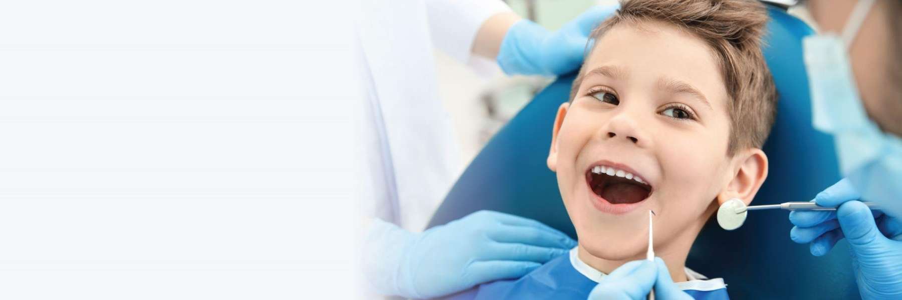 Kid undergoing dental examination at CFS Dental