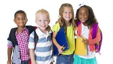 Kids holding each other after a dental session at CFS Dental