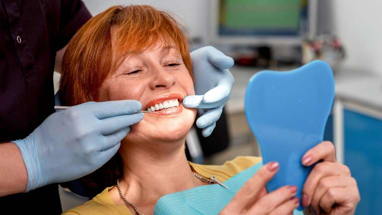 a woman during a dentist visit in Oatley, NSW