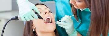Patient undergoing dental examination at CFS Dental