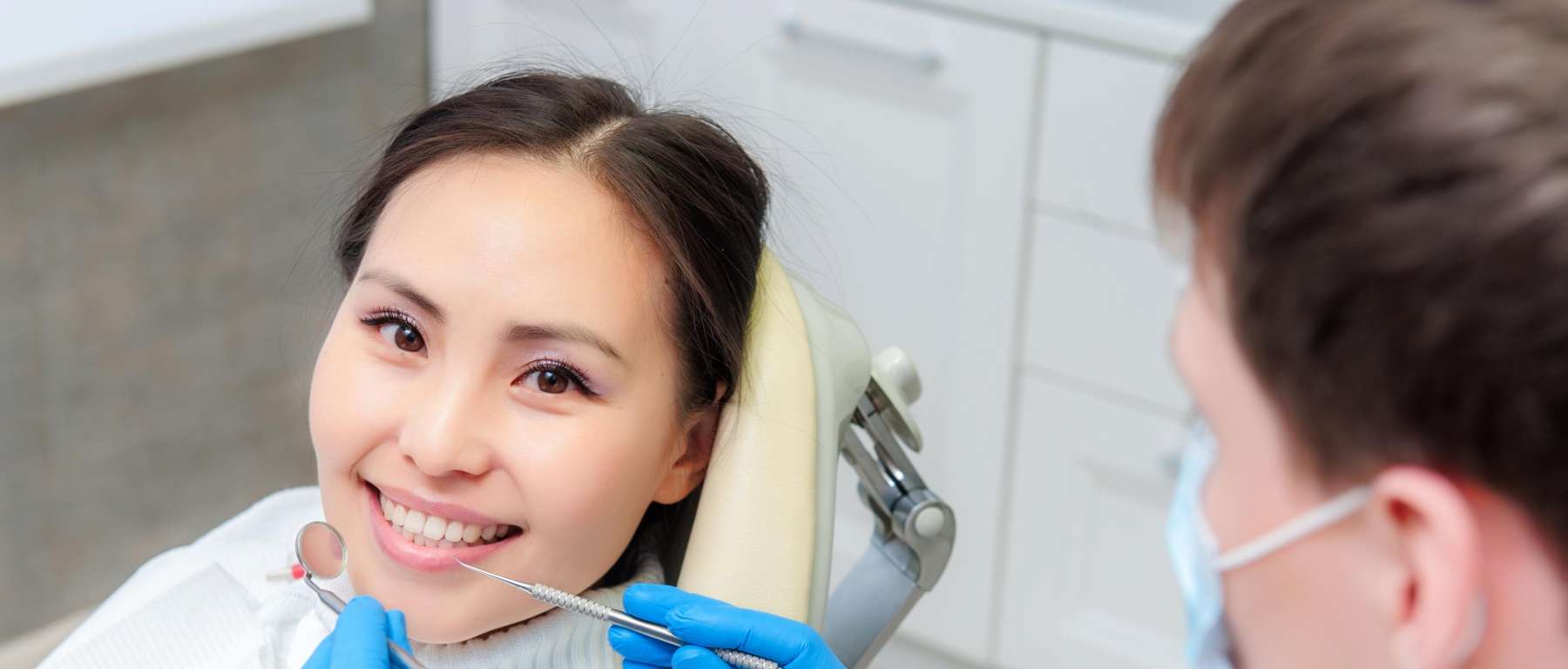 A lady smiling during a visit to Oatley dentist in NSW