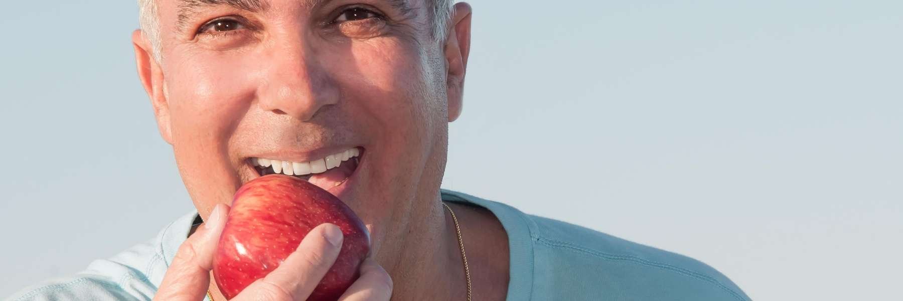Patient eating an apple in Oatley, NSW